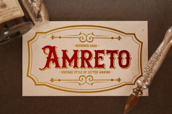 70+ Food Logo Fonts for Restaurants, Cafes, and Food Brands 134 Vintage business card design featuring the name Amreto in ornate lettering.
