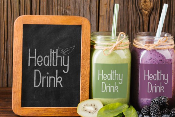 70+ Food Logo Fonts for Restaurants, Cafes, and Food Brands 36 Chalkboard and jars labeled 'Healthy Drink' with green and purple smoothies on a wooden background.