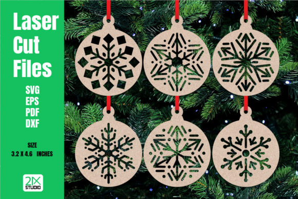 99+ Laser Cut Wood Projects To Sell From Home 161 Six laser cut snowflake ornaments displayed on a green Christmas tree background.