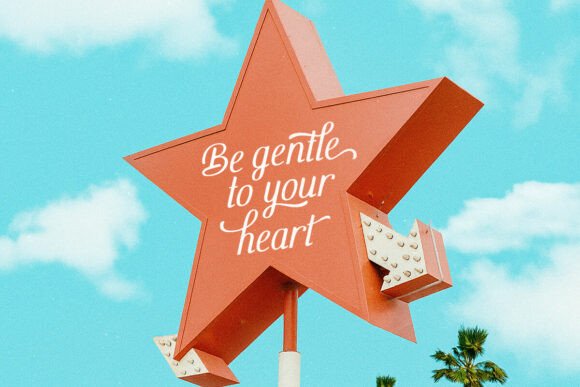 70+ Food Logo Fonts for Restaurants, Cafes, and Food Brands 22 Red star sign with the text 'Be gentle to your heart' against a blue sky.