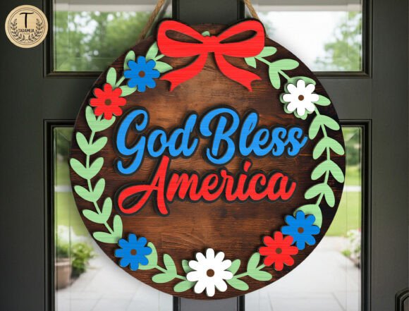 99+ Laser Cut Wood Projects To Sell From Home 171 Laser cut wood wreath with 'God Bless America' text and colorful floral accents.