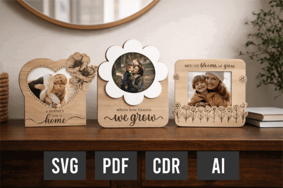 Laser Cut Products That Sell on Etsy and Make Money 11 Three personalized laser cut photo frames on a wooden table, showcasing different designs and styles.