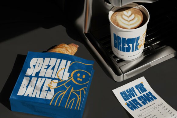 70+ Food Logo Fonts for Restaurants, Cafes, and Food Brands 131 A blue bakery box with a playful design, a coffee cup with latte art, and a receipt on a counter.