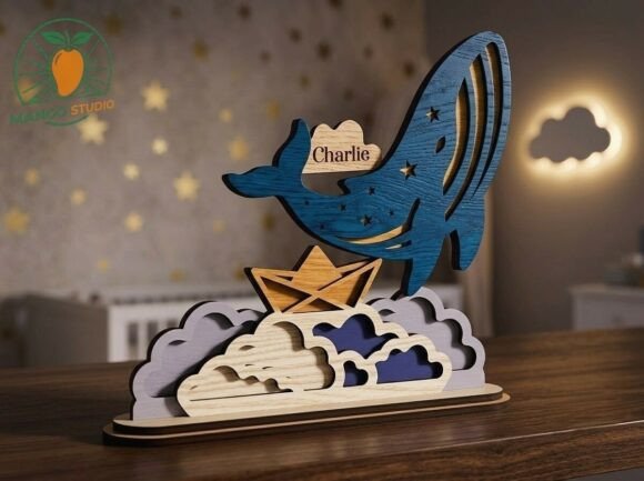 34 Acrylic Laser Cut Designs That Look Professional 4 3D whale nursery name sign with clouds and a boat, personalized with the name Charlie.