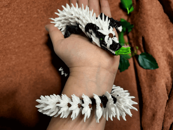 11 Most Profitable 3D Printing Models That Actually Sell 10 Articulated Flower Dragon 3D Printing 140654887 1 1 580x435 1
