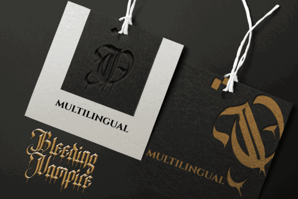 Halloween Fonts: 44 Best Picks for Cards, Signs & Cricut 82 Elegant tag design featuring the Bleeding Vampire font with a gold and black color scheme.