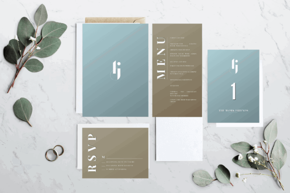 14 Editable Wedding Invitation Templates for Modern Couples 10 Minimal wedding invitation suite with RSVP and menu cards on a marble surface.