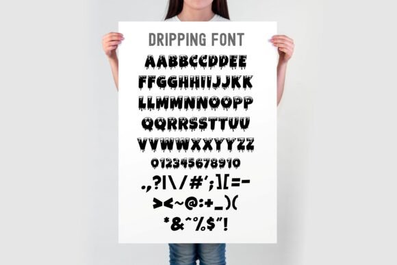 30 Best Halloween Fonts for Spooky Designs That Stand Out 41 Dripping font style displayed on a poster held by a person.