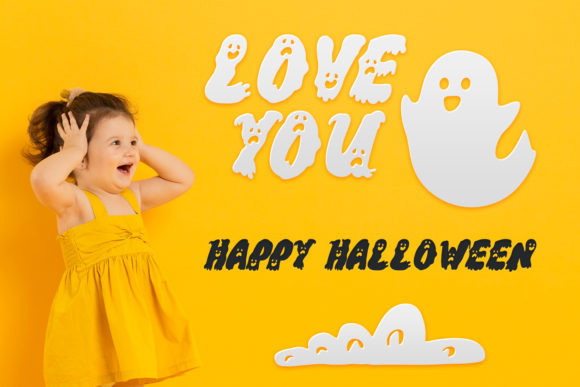47 Best Halloween Fonts for Crafts, Parties, and Products 49 Child in yellow dress with Halloween decorations saying 'Love You' and 'Happy Halloween' on a yellow background.