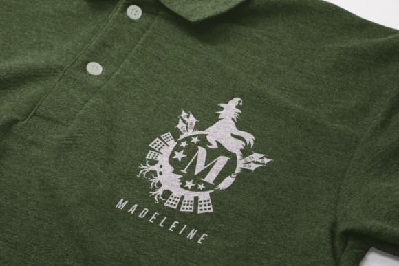 30 Best Halloween Fonts for Spooky Designs That Stand Out 4 Green polo shirt with a white graphic design featuring a wolf and the name Madeleine.