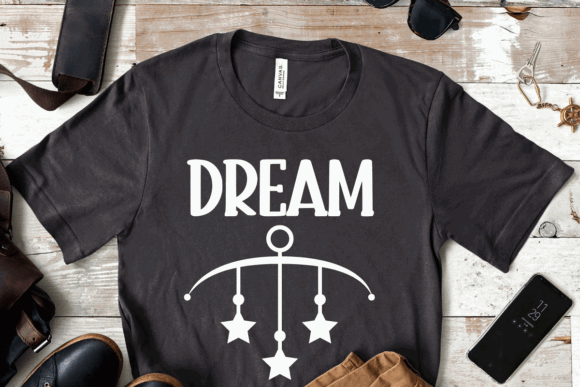 18 Best Slab Serif Display Fonts for Bold Headlines 17 Black t-shirt with the word 'DREAM' and a mobile hanging design.