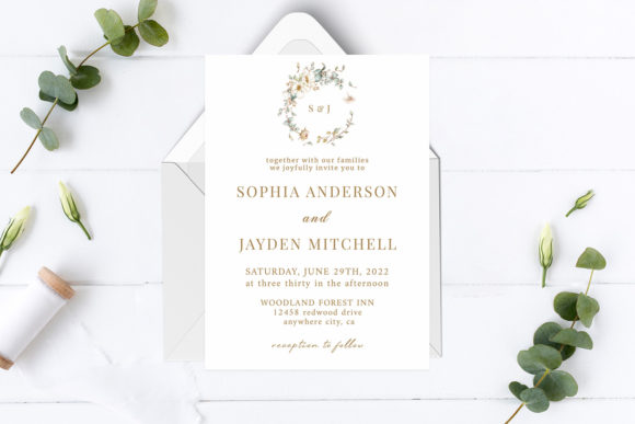 14 Editable Wedding Invitation Templates for Modern Couples 13 Elegant wedding invitation with floral wreath and gold typography on a white background.