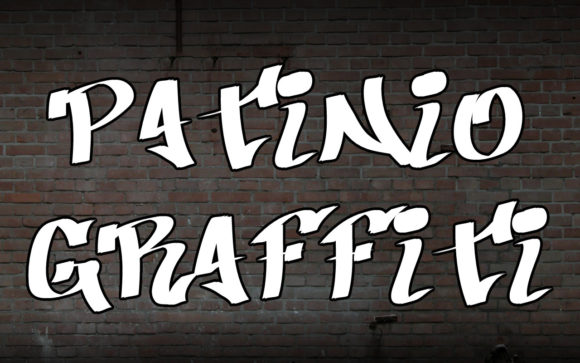 20 Best Graffiti Fonts for T-Shirt Design That Print Well 7 Patinio Graffiti font displayed on a brick wall background