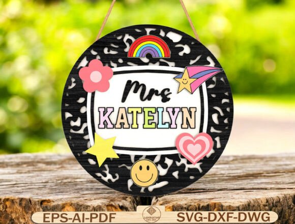Laser Cut Teacher Appreciation Gifts: 45 Personalized Ideas 29 Personalized round teacher sign with colorful decorations and the name Katelyn.