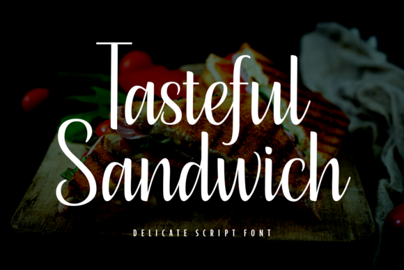 16 Handwritten Fonts for Commercial Use That Look Professional 22 Tasteful Sandwich handwritten font displayed over a sandwich on a wooden board.