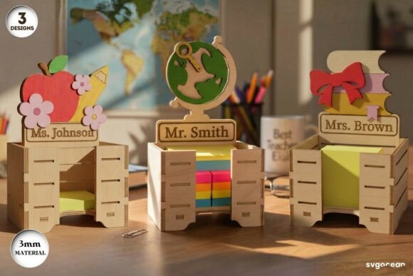 Laser Cut Teacher Appreciation Gifts: 45 Personalized Ideas 7 Three laser-cut sticky note holders with personalized names and designs, including an apple and a globe.