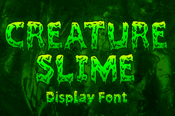 49 Thick Halloween Fonts for Bold Posters and T-Shirts 50 Green dripping font reading 'CREATURE SLIME' suitable for Halloween designs.
