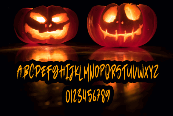 44 Spooky Halloween Alphabet Fonts for Posters and Crafts 74 Two carved pumpkins with glowing faces and Halloween-themed lettering.