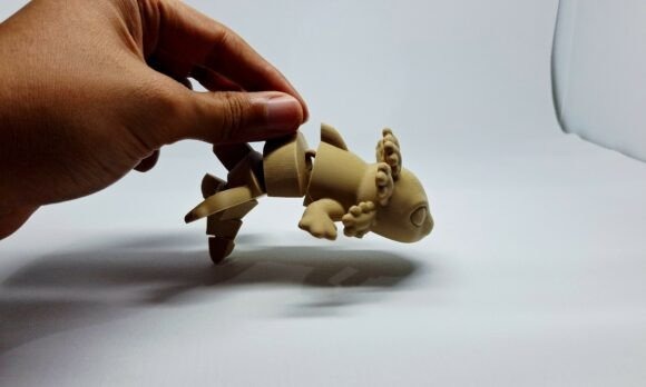 Flexi Axolotl 3D Print Model Flexi Axolotl STL 3D print model in hand