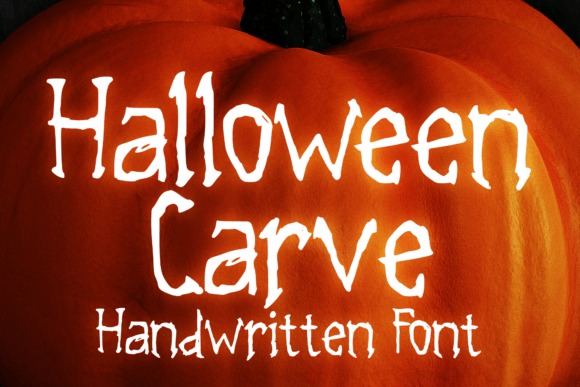 34 Halloween Lettering Fonts: Creepy Hand-Drawn Style 29 Halloween Carve font displayed on a pumpkin background โ Halloween lettering fonts