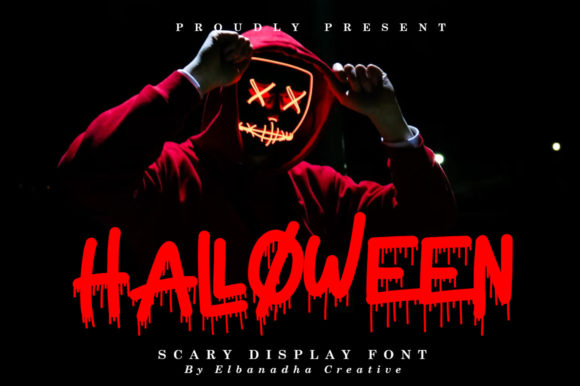 Weird Halloween Fonts: 32 Whimsical Picks for Creative Designs 45 A person in a red hoodie wearing a glowing mask with a scary face, showcasing a Halloween-themed font.