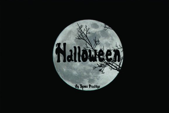 Halloween Bubble Letter Fonts: 27 Cute Spooky Picks 45 Spooky Halloween text with a full moon background and tree branches.