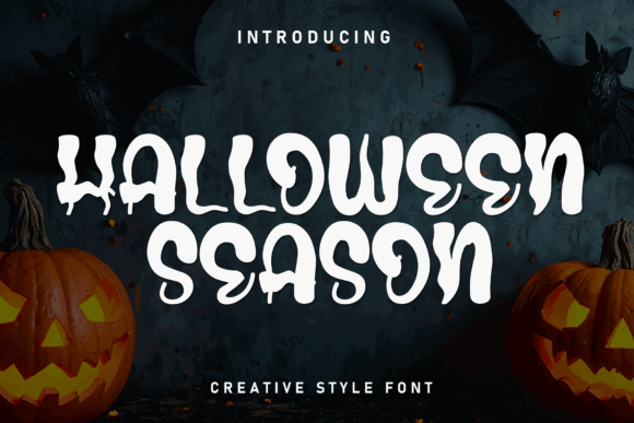 39 Quirky Halloween Fonts for Playful Spooky Designs 31 White quirky Halloween Season text with dripping details on dark background with bats and carved pumpkins