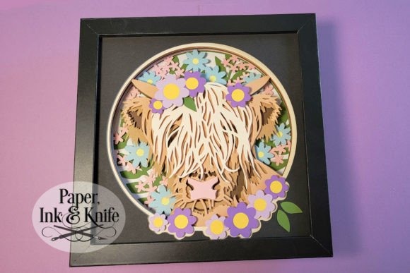 30 Best Layered Highland Cow Laser Cut Files for Decor 13 Layered Highland Cow Laser Cut Files in a shadowbox with floral accents