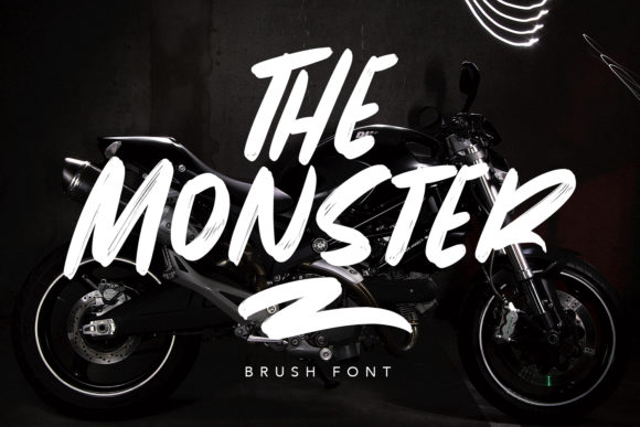 Halloween Bubble Fonts: 36 Playful Picks for Spooky Crafts 37 The Monster brush font displayed over a black motorcycle in a dark setting