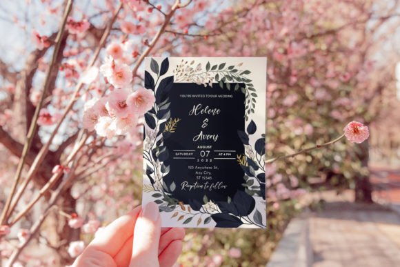 Garden Party Invite Template: 28 Beautiful Floral Designs 11 Floral wedding invitation held in front of blooming cherry blossoms.