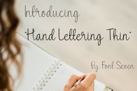 15 Lettering Fonts for creative lettering projects 7 Hand Lettering Thin font sample showing smooth handwriting style on notebook — Lettering Fonts