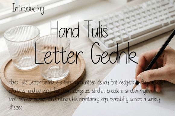 15 Lettering Fonts for creative lettering projects 4 Hand Tulis Letter Gedrik thin monoline handwritten lettering font on paper with keyboard and glass cups — Lettering Fonts