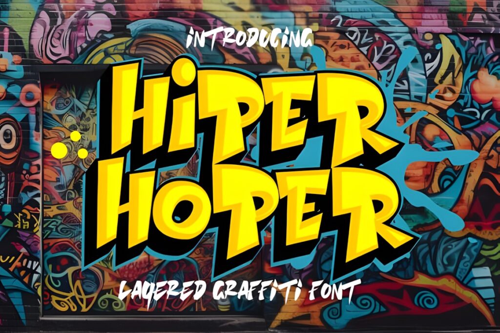 35 Graffiti Lettering: Font Picks for Street Art Designs 11 Graffiti Lettering in bold yellow layered font spelling Hiper Hoper on colorful street art background