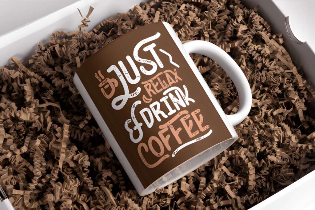 29 Canva Fonts for Painted Banners That Stand Out 78 Mug with a painted banner style design using Canva fonts for painted banners saying Just Relax & Drink Coffee