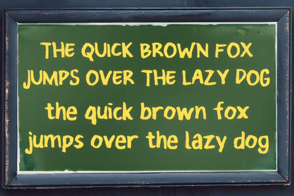 29 Canva Fonts for Painted Banners That Stand Out 82 Chalkboard with yellow hand-painted style text showing the phrase the quick brown fox — Canva fonts for painted banners